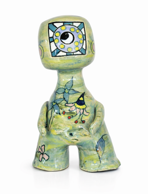 Whimsical Shoreling clay art monster with textured surface.