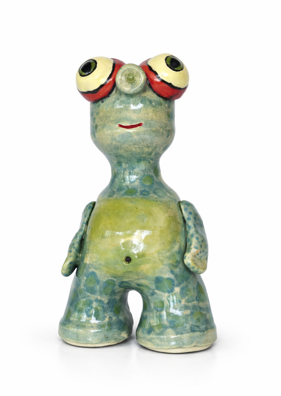 Collectible Shoreling guardian creature in natural glaze tones.