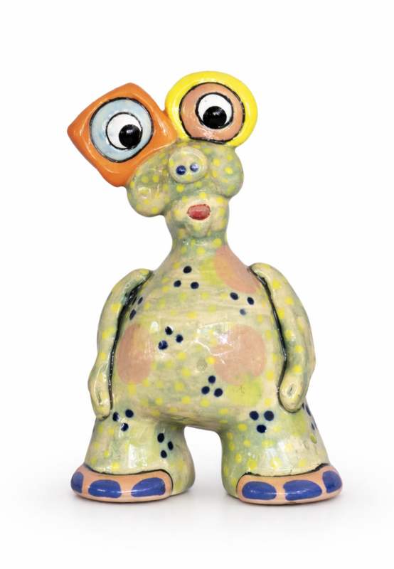 Kiln-fired clay monster inspired by ocean and earth.