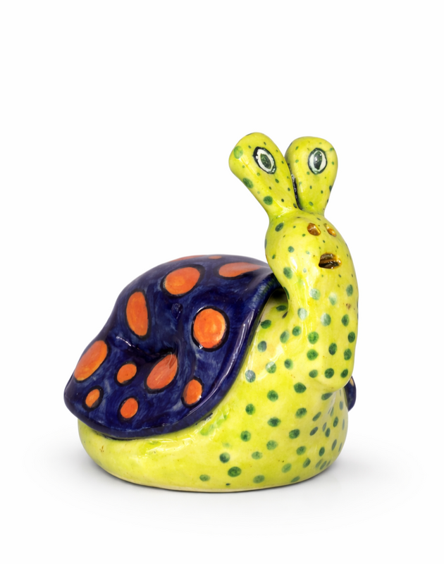 Mysterious ceramic guardian creature with organic form.