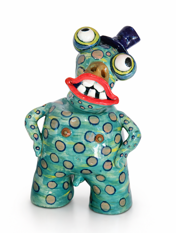 Handcrafted clay guardian monster for shelf decor by coastal clay works.