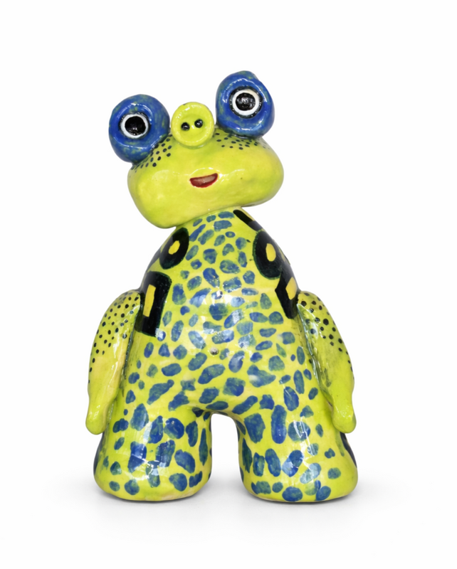 Coastal Clay works whimsical guardian creature made from hand-built clay.