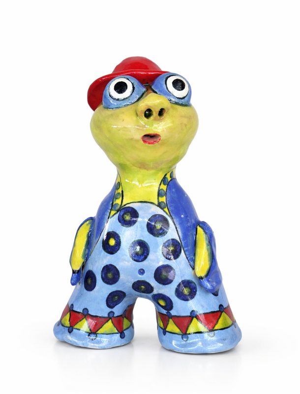 Handmade ceramic sea creature inspired by shoreline textures.